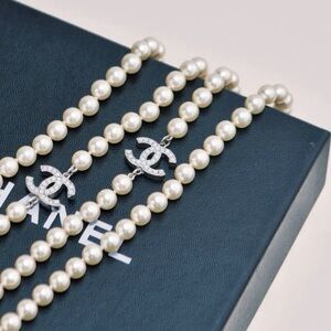 Chanel Graduated Faux Pearl CC Logo Long Sautoir Necklace